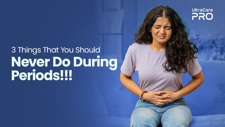 Period pain and menstrual cramps — Indian woman holding lower abdomen in discomfort during menstruation