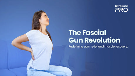 Woman experiencing lower back pain on sofa highlighting need for fascial massage gun therapy and muscle recovery