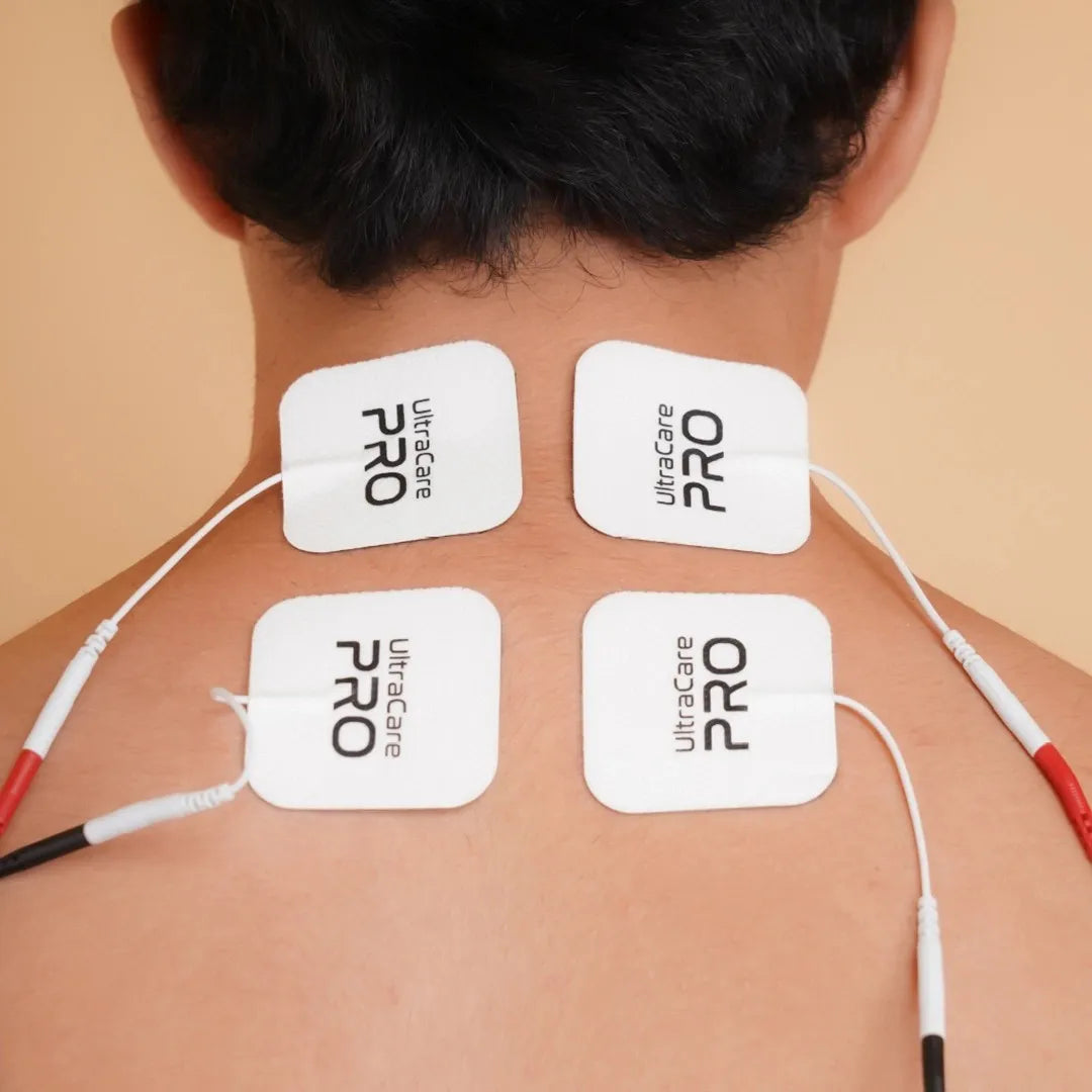 UltraCare PRO TENS Electrode Pads Applied on Neck and Upper Back for Pain Relief Physiotherapy